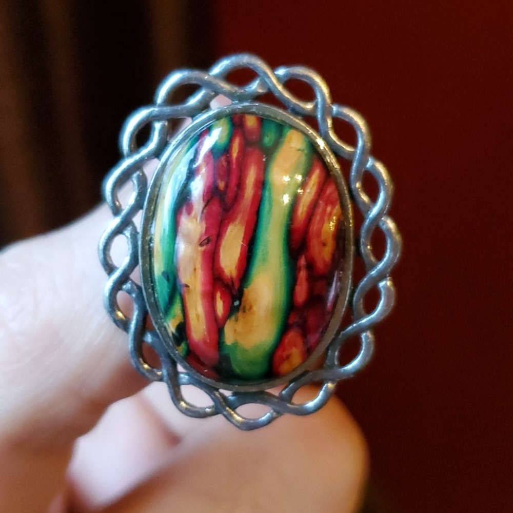 Vintage pewter tone brooch with red and green